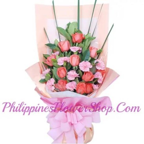 Truly Blessed Orange Roses and Pink Carnations