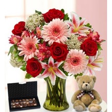 Lovely (12 Roses + 6 Gerbera Daises + 2 Liliumus)