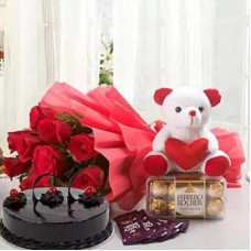 Love Combo With Chocolate Cake (Bouquet of 12 Red Roses, Cadbury Dairy Milk Chocolate - 5 (12.5 grams each), Teddy Bear - 6 inches, Ferrero Rocher Chocolate Box - 16 pcs, Chocolate Cake - 500 grams)