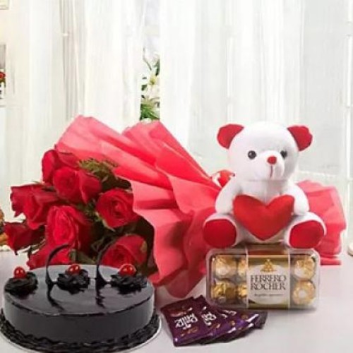Love Combo With Chocolate Cake (Bouquet of 12 Red Roses, Cadbury Dairy Milk Chocolate - 5 (12.5 grams each), Teddy Bear - 6 inches, Ferrero Rocher Chocolate Box - 16 pcs, Chocolate Cake - 500 grams)