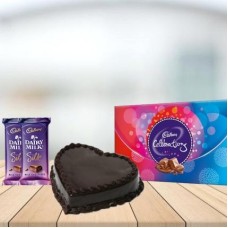 Heart Chocolate Cake with Assorted Chocolates Combo (1/2 kg Heart Chocolate Cake With Cadbury Celebration and 3 Cadbury Dairy Milk Silk (60 gm))