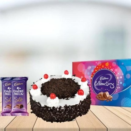 Black Forest Cake with Assorted Chocolates Combo (1/2 kg Black Forest Cake With Cadbury Celebration and 3 Cadbury Dairy Milk Silk (60 gm))