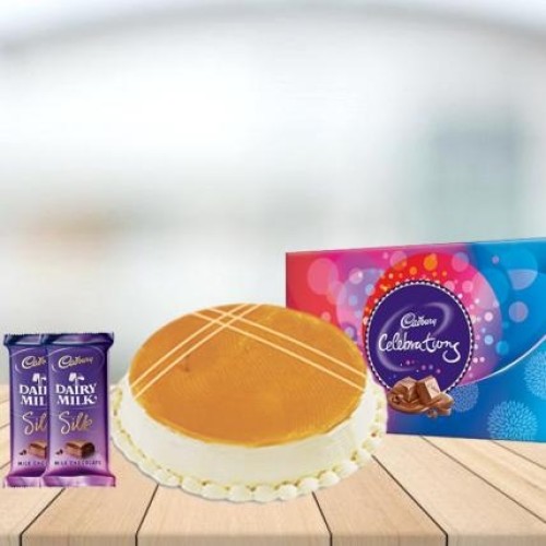 Butterscotch Cake with Assorted Chocolates Combo (1/2 kg Butterscotch Cake With Cadbury Celebration and 3 Cadbury Dairy Milk Silk (60 gm))