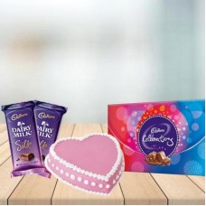 Heart Strawberry Cake with Assorted Chocolates Combo (1/2 kg Heart Strawberry Cake With Cadbury Celebration and 3 Cadbury Dairy Milk Silk (60 gm))