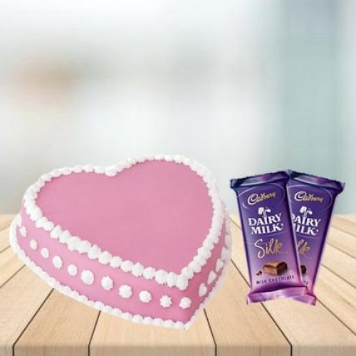 Heart Shape Strawberry Cake with Cadbury Silk Combo (1/2 kg Heart Shape Strawberry Cake With 3 Cadbury Dairy Milk Silk (60 gm))