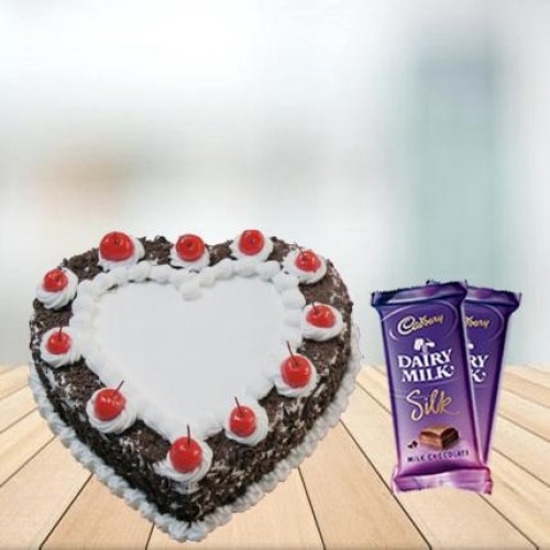Heart Shape Black Forest Cake with Cadbury Silk Combo (1/2 kg Heart Shape Black Forest Cake With 3 Cadbury Dairy Milk Silk (60 gm))
