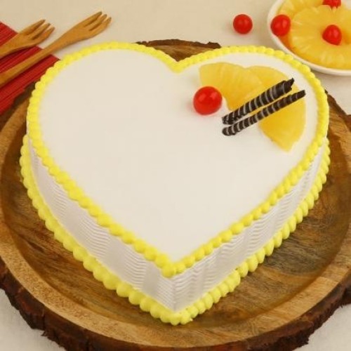 Exclusive Heart Shape Pineapple Cream Cake (1/2 Kg Cake)
