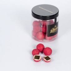 Licorice with white chocolate, raspberries and chili