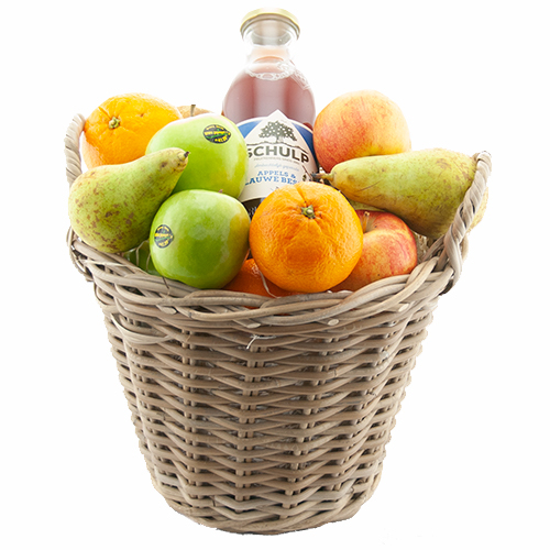 Fruit basket full of picked fruit and juice