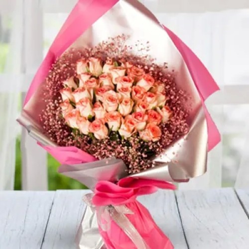 Bouquet Of Peach Roses (Bouquet of 30 stems of peach roses with babys breath fillers)