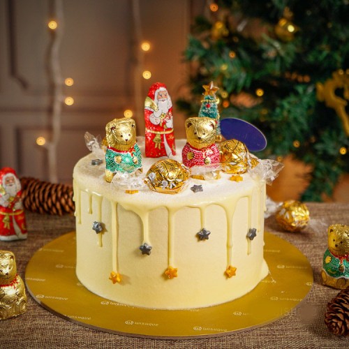 Lindt Gold Winter Wonderland White Chocolate Drip Ribbon Cake