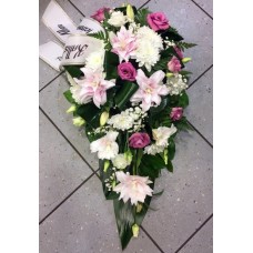 Funeral arrangement: lilys and pink spices