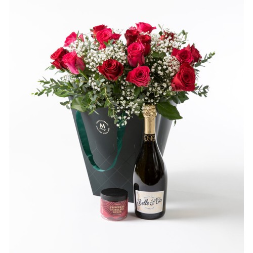 Rose bouquet in red and pink in a gift bag with bubbles