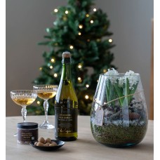 Swivel in glass vase with drink and chocolate
