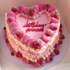 Elegantly Piped Heart Shaped Cake