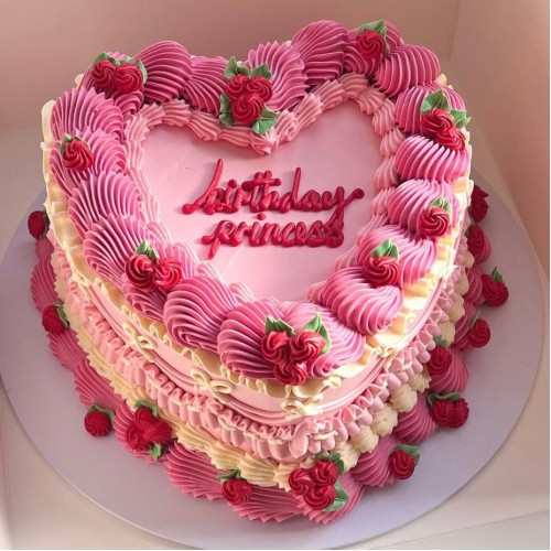 Elegantly Piped Heart Shaped Cake
