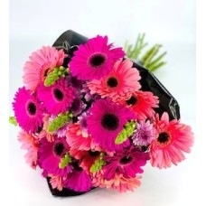 Bouquet of gerberas, puppies and chrysanthemums