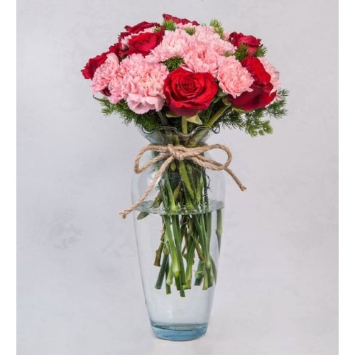 Detail Of Pink Carnations And Red Roses
