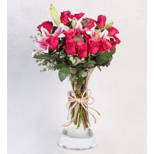 Pink Lilies And Topaz Roses In Vase