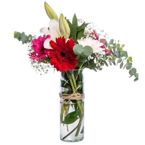 Colorful Gerberas and White Lilies in a Vase