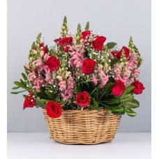 Basket Of Pink Perritos And Red Roses