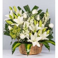White Roses, Lilies and White Snapdragons in a Wicker Basket