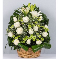 White Roses, Lilies and Green Cuts in a Wicker Basket