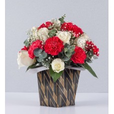 Arrangement Of White Roses With Candy Detail
