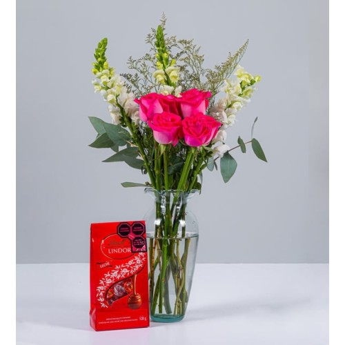 Pink Roses With White Perritos And Lindt