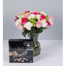 Arrangement Of Roses In Shades Of Pink And Lindt Bitter