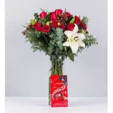 Red Roses And White Lilys In Cylinder And Lindt