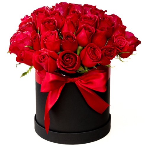 Red roses in tall black round box