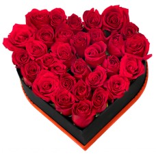 Red roses in heart shaped box
