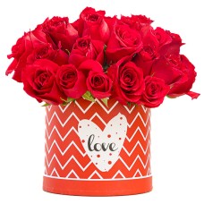 Red roses in round Love box