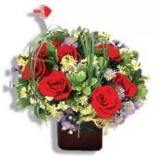 Design with Roses and other fresh flowers in a glass vase