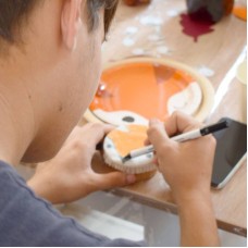 9 cupcakes with food pens
