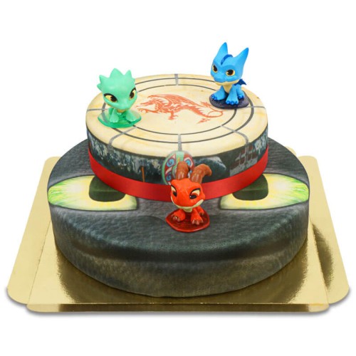 Dragons on tiered cake with ribbon