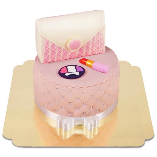 Deluxe make-up cake, round twice as high with a white chocolate bag (Small ((18 cm)12 servings))