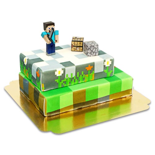 Minecraft figure on two-tiered game world cake