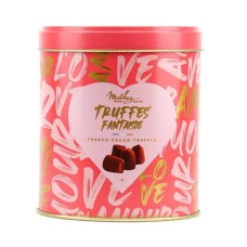 Fancy truffles with raspberry macaroon chips in Love box