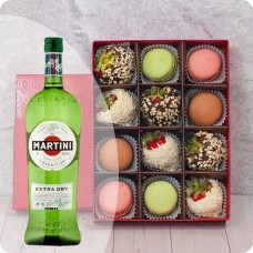 Strawberries in chocolate with macaroons and Martini