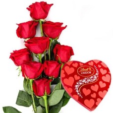 9 red roses with Lindt pralines in a heart-shaped box
