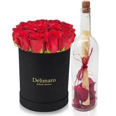 Flowerbox with letter in a bottle