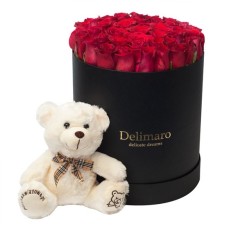 Flowerbox with a teddy bear