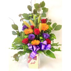 Selection of Bright Flowers Hand Tied With Chocolates