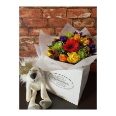 Flowers sent with a Soft toy