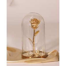 Golden rose in a flask
