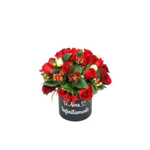 Floral arrangement with roses and ferreros