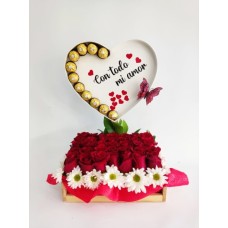 Arrangement in a wooden box with roses and chocolates