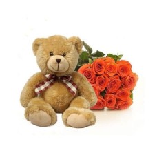 Bouquet of orange roses and Teddy Bear